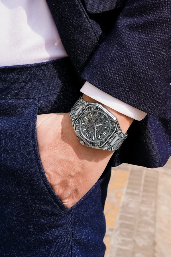 Man wearing a suit and a watch.