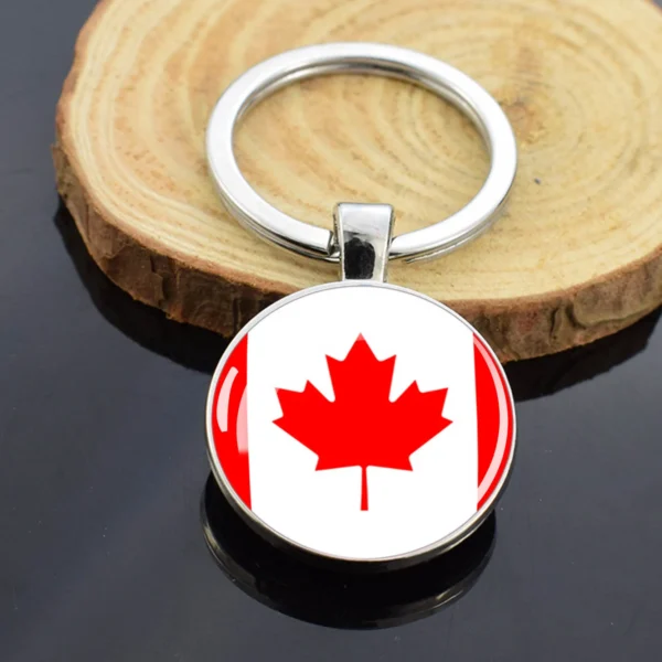 Canadian flag keychain with silver ring.