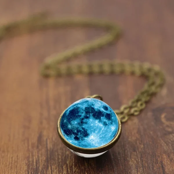 Blue moon glass pendant necklace.