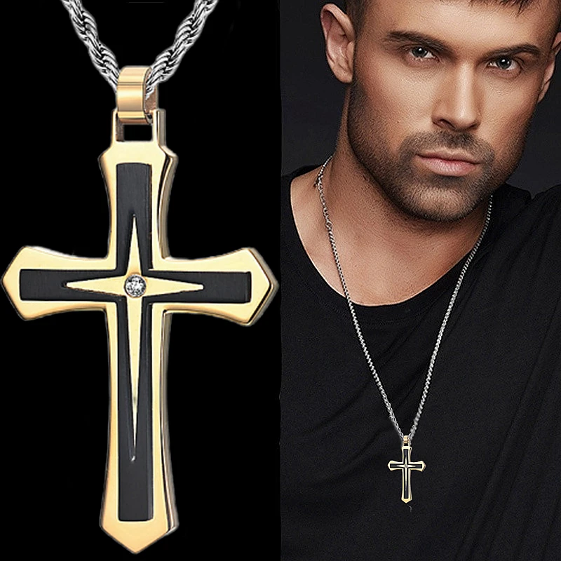 Gold and black cross pendant necklace.