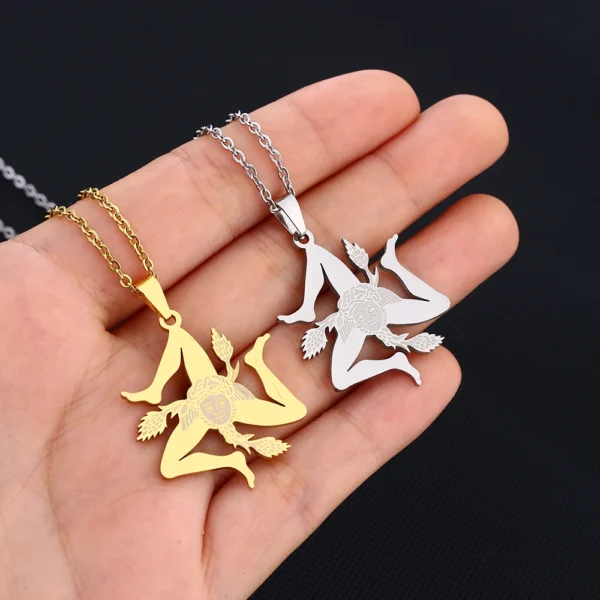 Gold and silver Trinacria necklaces.