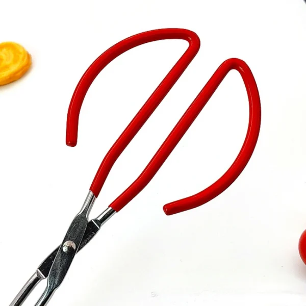 Red-handled metal tongs on white background.