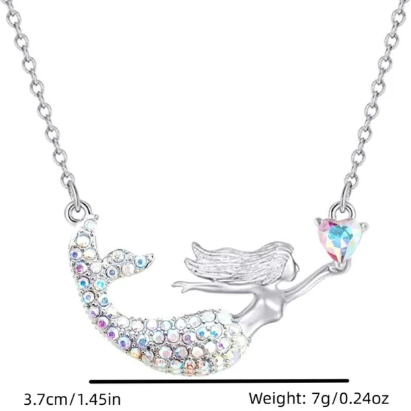 Silver crystal mermaid necklace with heart.