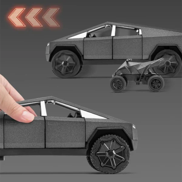 Gray toy truck and ATV models.