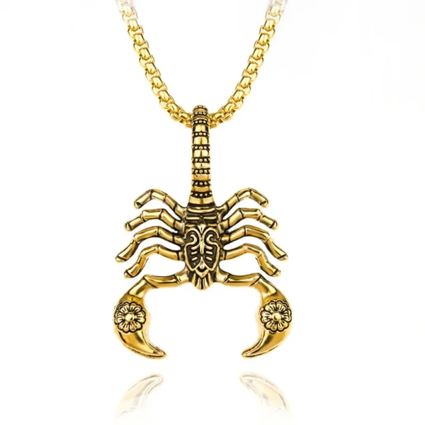 Gold scorpion pendant on chain necklace.