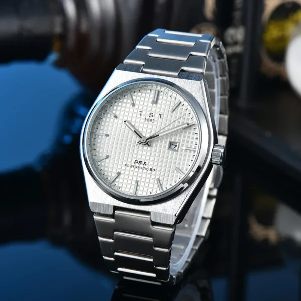 Silver analog wristwatch with metal band.