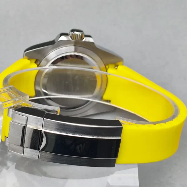 Silver and yellow wristwatch on yellow band.