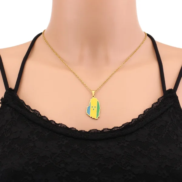 Gold necklace with Saint Kitts and Nevis flag pendant.