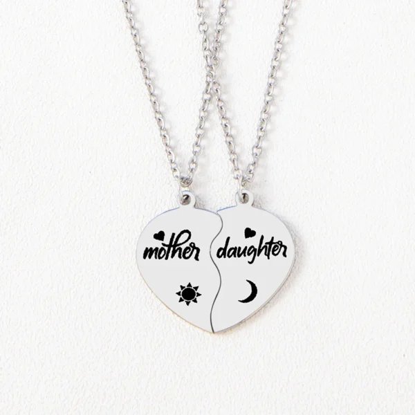 Mother and daughter heart necklaces.