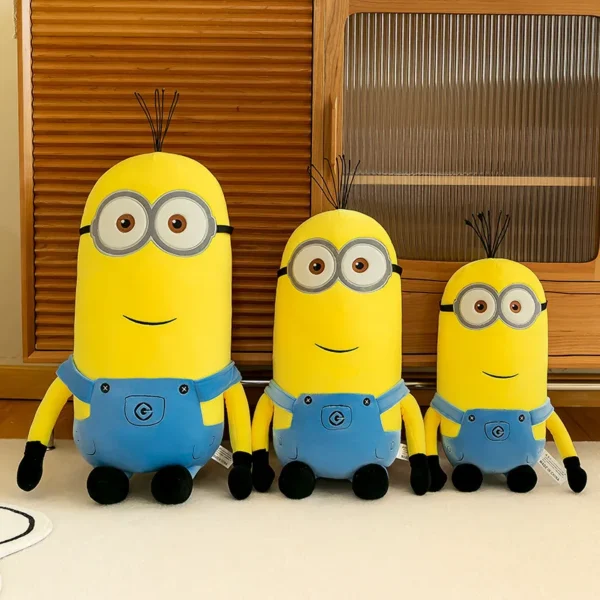 Three plush Minions in different sizes.