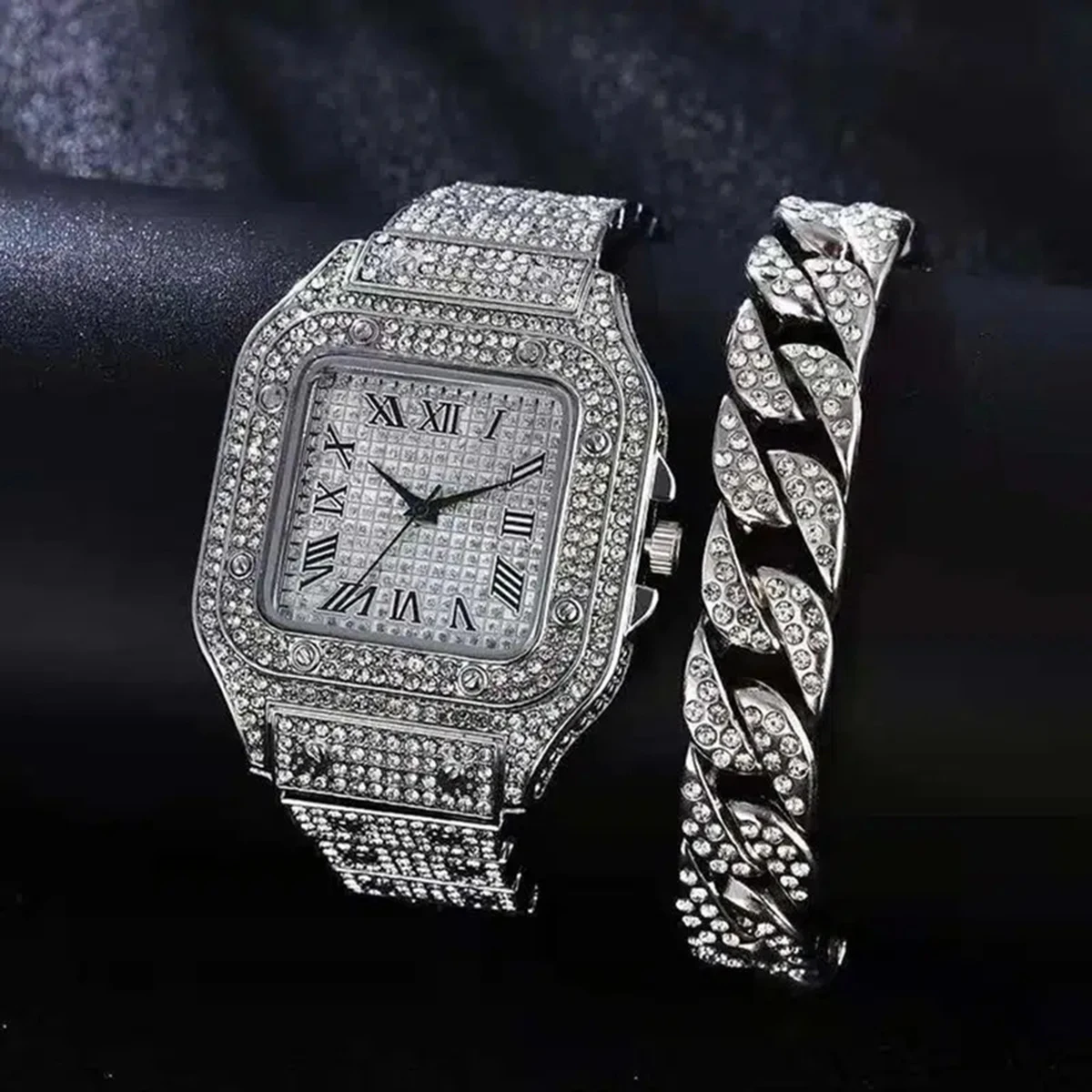 Diamond watch and chain set in silver.