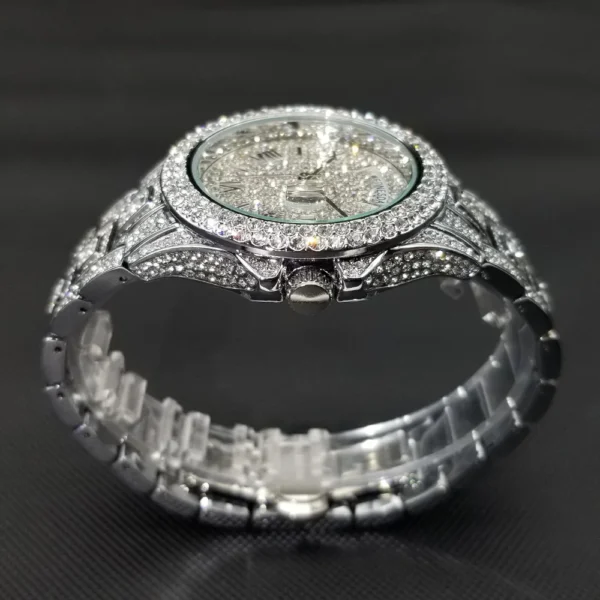 Diamond encrusted silver wristwatch.