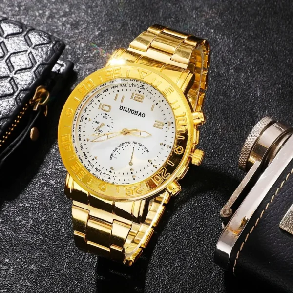 Gold analog wristwatch with date and day display.