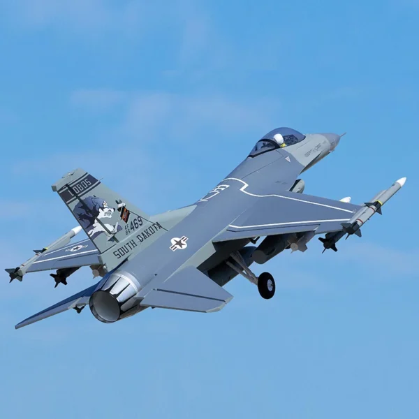 Grey F-16 fighter jet in flight.