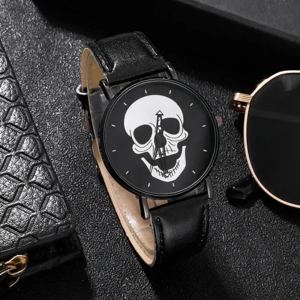 Black leather wristwatch with skull face.