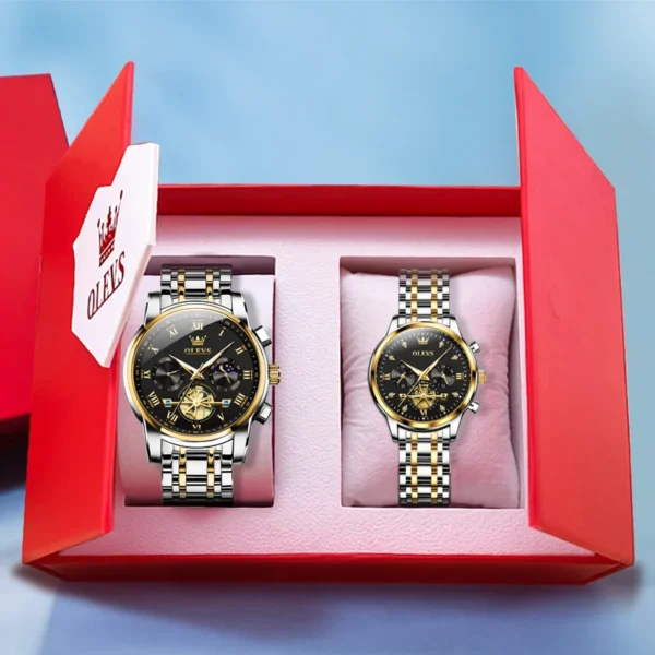 Two gold and silver analog watches in a red box.