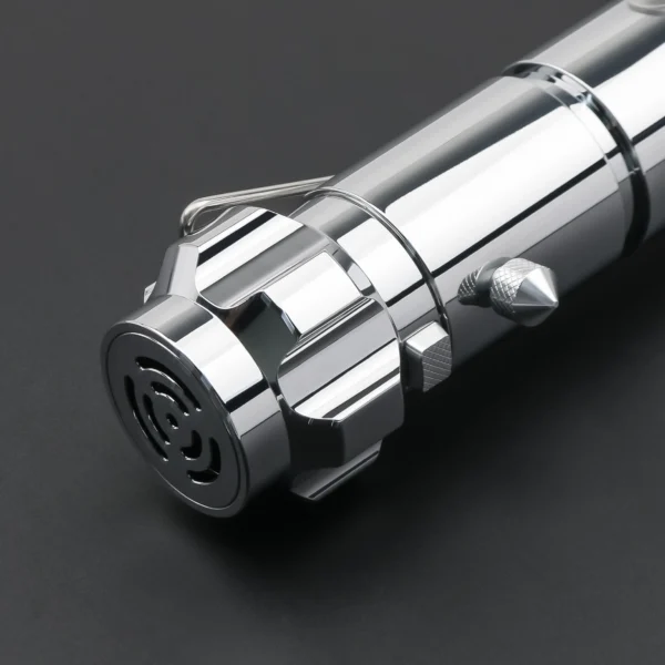 Close-up of a silver lightsaber hilt.