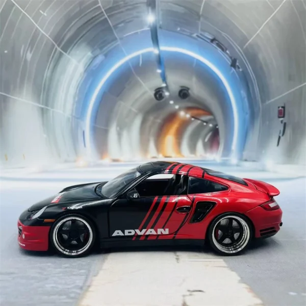 Black and red sports car in tunnel.