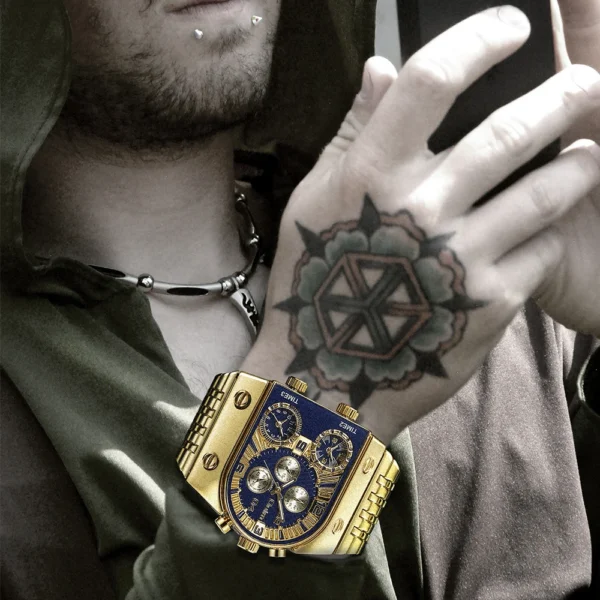 Man wearing a gold watch with a blue face.