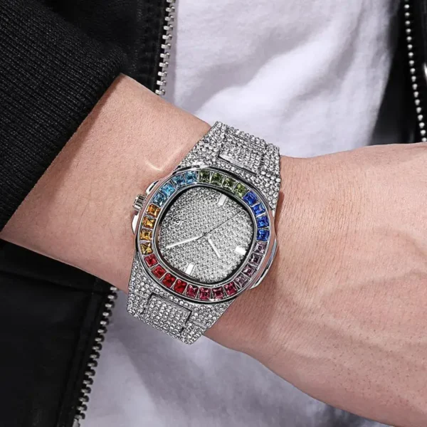 Diamond watch with rainbow gems on wrist.