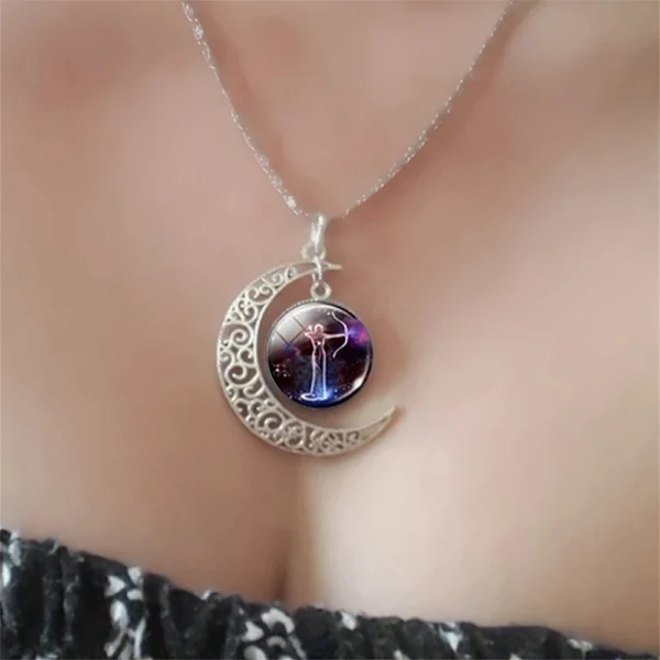 Silver crescent moon necklace with Sagittarius