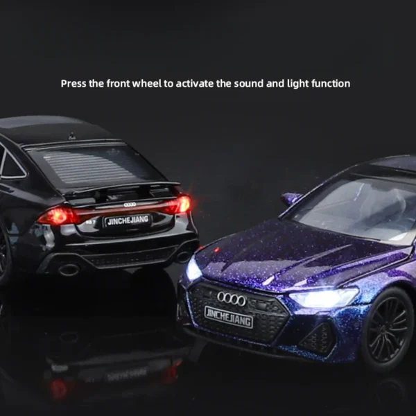 Two black Audi toy cars with lights.