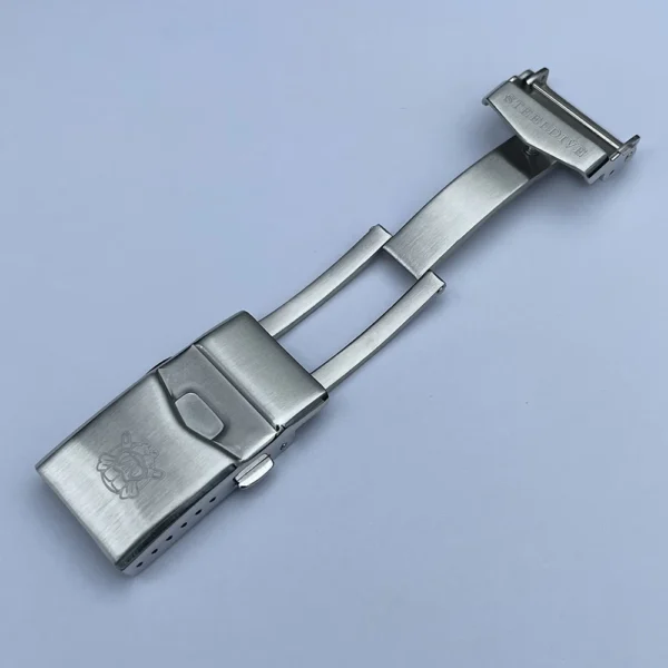 Stainless steel watch band clasp.