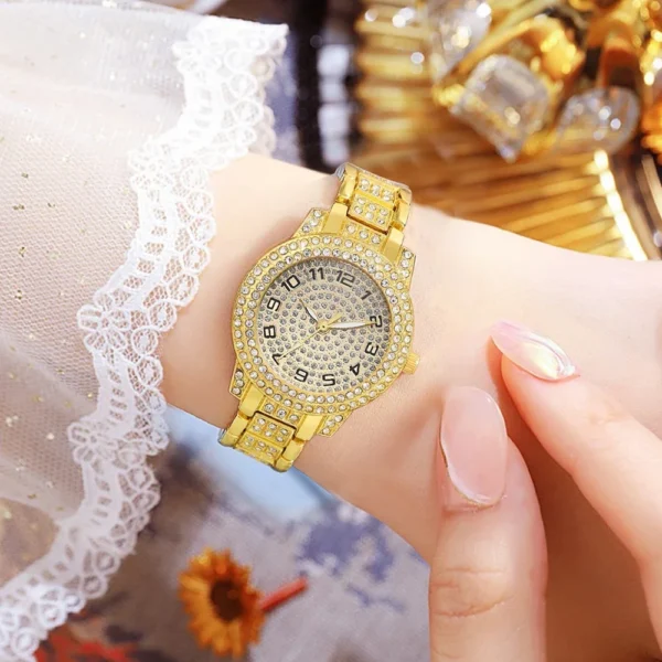 Gold wristwatch with diamond accents.