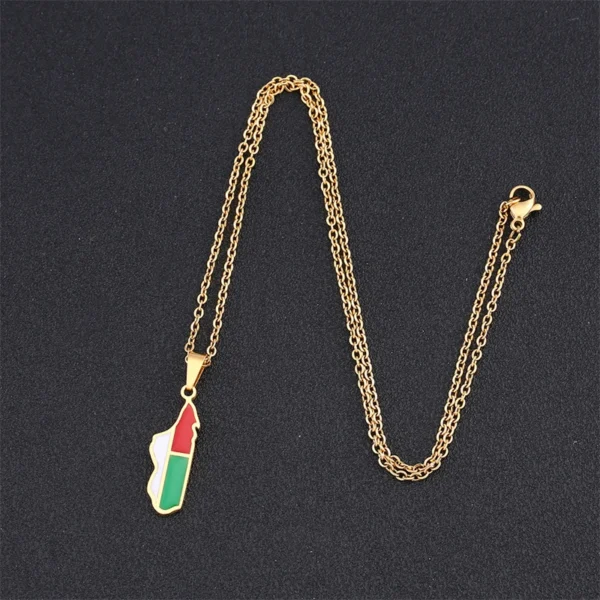 Gold chain necklace with red, white, and green pendant.