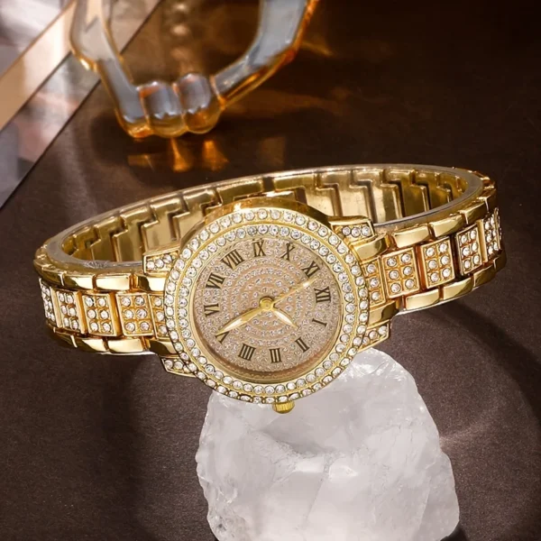 Gold watch with diamond accents.