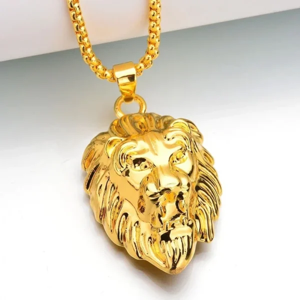 Gold lion head pendant necklace.