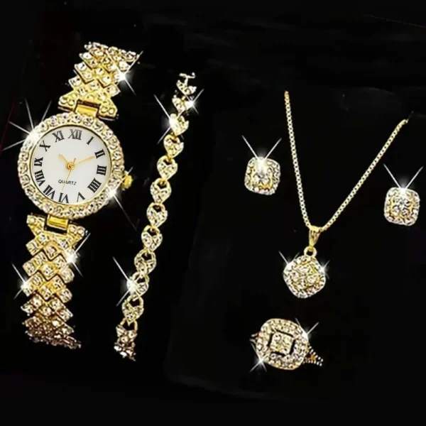 Gold jewelry set with watch, necklace, and ring.