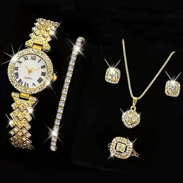 Gold watch, necklace, bracelet, and earrings set.