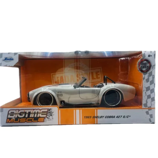 White 1965 Shelby Cobra 427 S/C diecast model.