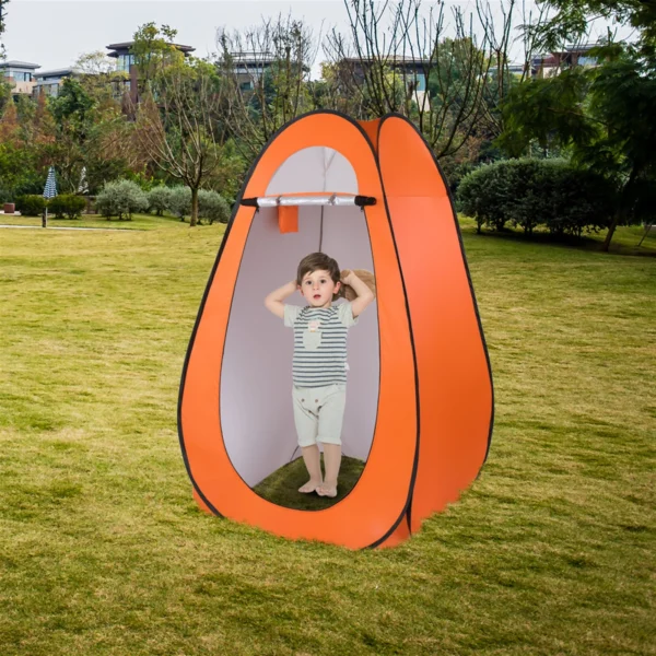 Orange pop-up tent with child inside.