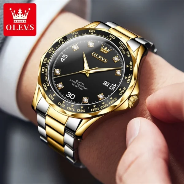 Gold and silver Olevs wristwatch with diamonds.