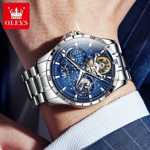 Silver Olevs automatic wristwatch with blue face