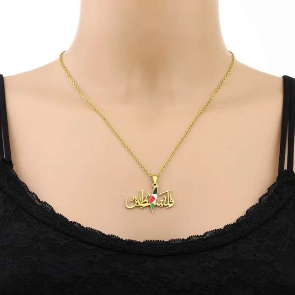 Gold necklace with Palestinian flag pendant.