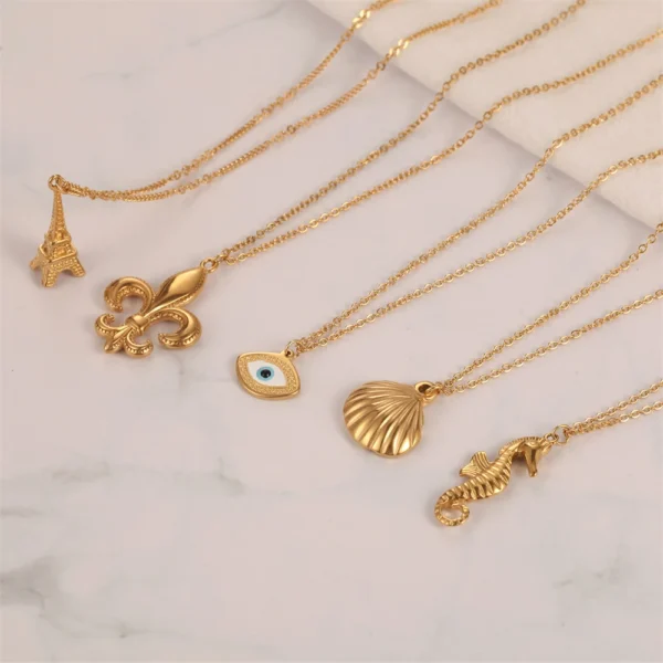 Gold necklaces with various charms.