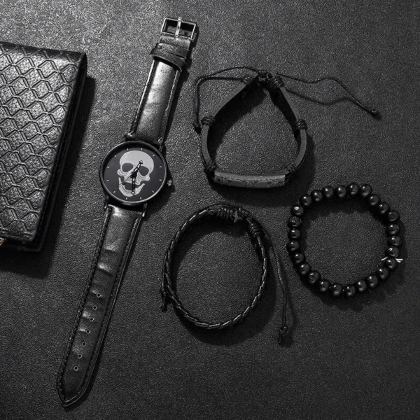 Black skull watch and bracelet set.