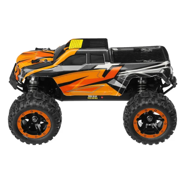 Orange and black remote control truck.