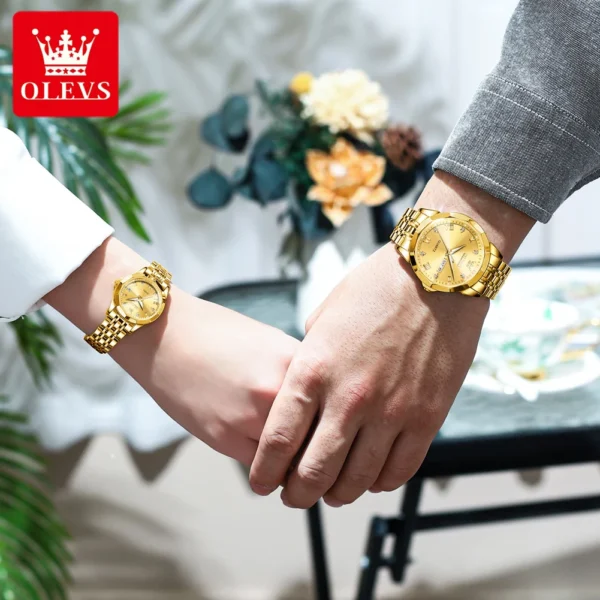 Couple wearing matching gold watches.