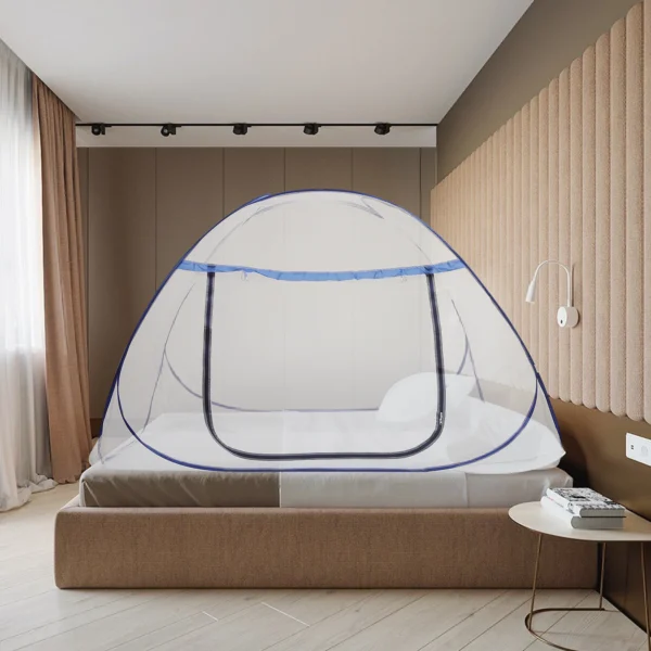 White mosquito net over bed frame.