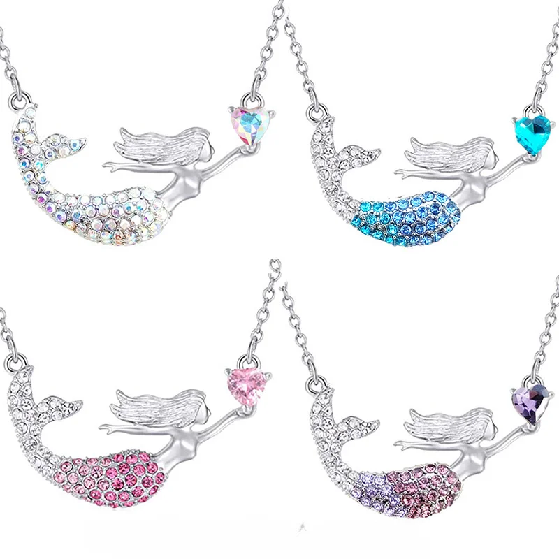 Four crystal mermaid necklaces with hearts.