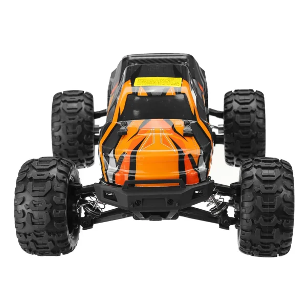 Orange and black remote control truck.