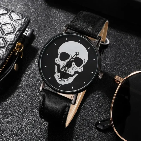 Black leather wristwatch with skull face