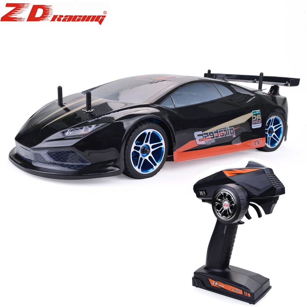 Black remote control sports car with controller.