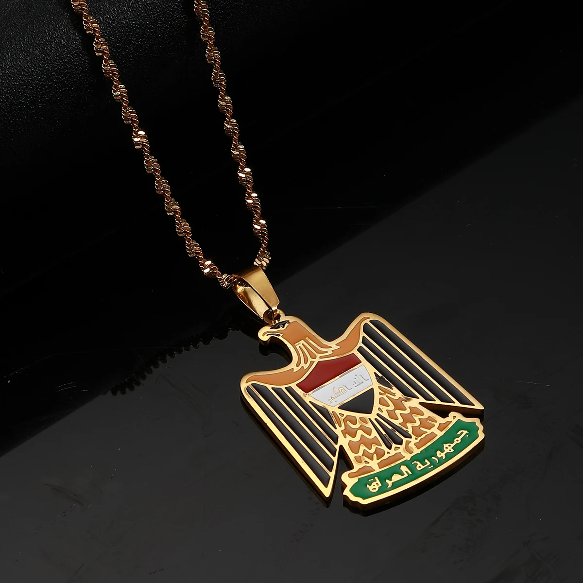 Gold Egyptian eagle pendant necklace.