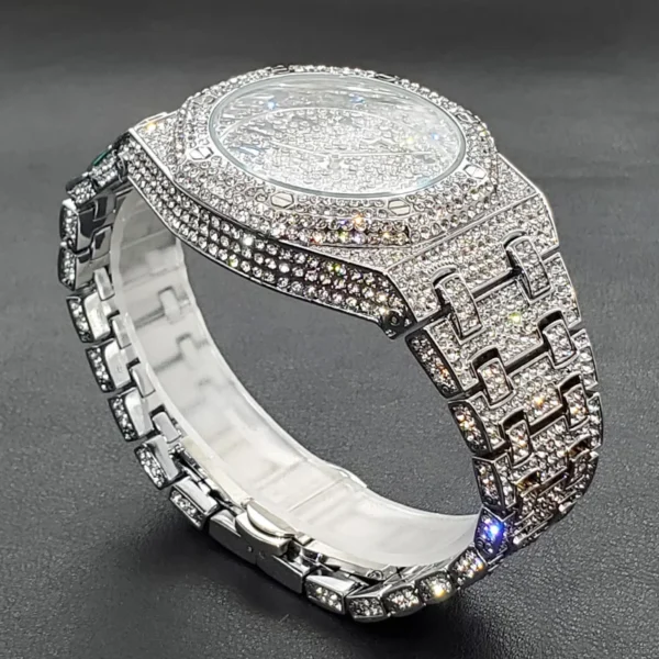 Diamond encrusted silver wristwatch.