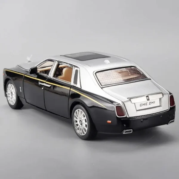 Black and silver toy Rolls Royce car.